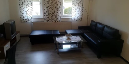 Monteurwohnung - Langelsheim - Wohnzimmer mit Essbereich - Altenau
