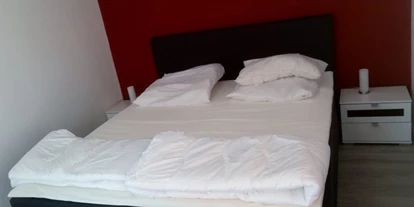 Monteurwohnung - Langelsheim - Schlafzimmer mit Boxspringbett - Schulenberg