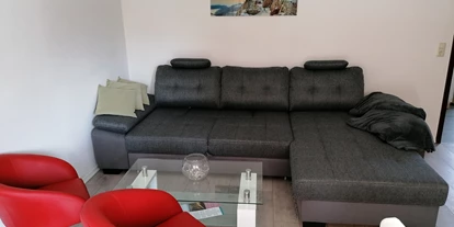 Monteurwohnung - Langelsheim - Wohnzimmer mit Schlafsofa - Hahnenklee Bockswiese