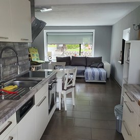 Monteurzimmer: Küche/Wohnbereich Gästehaus 4 - Ferienhaus- und Zimmervermietung Petra Hähnel