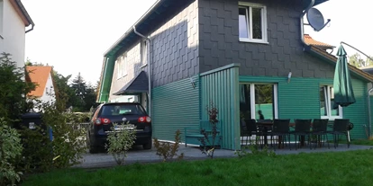 Monteurwohnung - Bettwäsche: Bettwäsche gegen Gebühr - Deutschland - Gartenseite mit Grill und Outdoormöbeln - Harz-Holidays