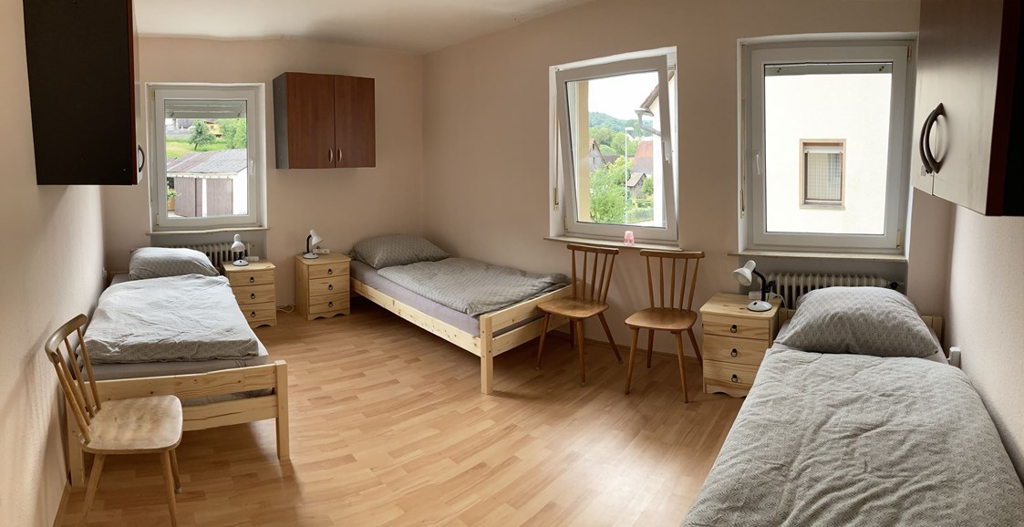 Monteurzimmer: Schlafzimmer - Franz Berg Apartments