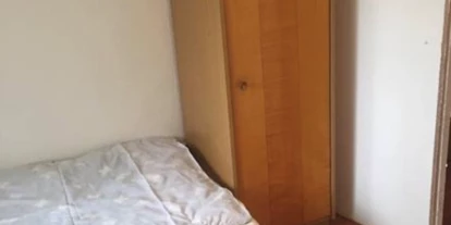 Monteurwohnung - PLZ 90562 (Deutschland) - Bett mit Schrank  - Miabon123