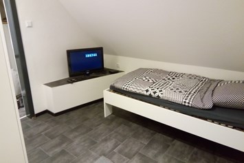 Monteurzimmer: Zimmer Bett Fernseher - Pension Anette