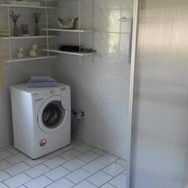 Monteurzimmer: Waschmaschine und Dusche - MonteursWohnung Spahnharrenstätte