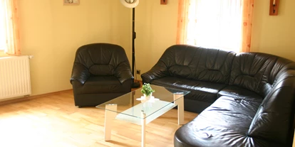 Monteurwohnung - Wernigerode - Wohnbereich Sitzecke - Ferienwohnung "Altstadtblick" - top Ausstattung